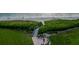 Aerial view of the beach access with beach views at 6480 Midnight Pass Rd # 316, Sarasota, FL 34242