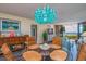 Dining room with beach themed decor, seating for four and a view at 6480 Midnight Pass Rd # 316, Sarasota, FL 34242
