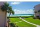 Beautiful beachside condo featuring direct beach access and lush landscaping at 6480 Midnight Pass Rd # 316, Sarasota, FL 34242