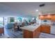 Open concept kitchen and dining room featuring beach views at 6480 Midnight Pass Rd # 316, Sarasota, FL 34242