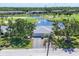 Aerial view of the condo, backing onto a beautiful golf course and a serene lake at 7069 W Country Club N Dr # 7069, Sarasota, FL 34243
