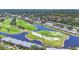 Aerial view of condos along the lush golf course and waterfront community at 7069 W Country Club N Dr # 7069, Sarasota, FL 34243