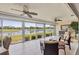 Relaxing lanai with picturesque views of the lake and golf course at 7069 W Country Club N Dr # 7069, Sarasota, FL 34243
