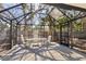 Enclosed lanai with seating offering a shaded outdoor space at 717 Treasure Boat Way, Sarasota, FL 34242