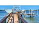 Dock with boat and boat lift for convenient waterfront access at 7342 Captain Kidd Ave, Sarasota, FL 34231