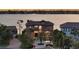 Beautiful two-story home with a lush front yard and inviting curb appeal at 7342 Captain Kidd Ave, Sarasota, FL 34231