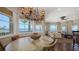 Living room with natural lighting from large windows and views of the water at 7342 Captain Kidd Ave, Sarasota, FL 34231
