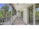Spacious screened balcony features ceiling fans and sliding glass doors for seamless indoor/outdoor living at 7632 Marsh Orchid Cir # 7632, Bradenton, FL 34203