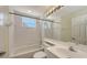 Bathroom features a shower/tub combo, vanity and coordinating mirror at 7632 Marsh Orchid Cir # 7632, Bradenton, FL 34203