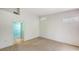 Bright bedroom boasts neutral carpet, clean white walls and ample natural light at 7632 Marsh Orchid Cir # 7632, Bradenton, FL 34203