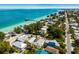 Wonderful aerial view showcasing beach proximity and neighborhood charm at 811 Jacaranda Rd, Anna Maria, FL 34216