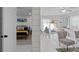 Bright and open living space connecting the bedroom and dining area, creating a seamless flow at 811 Jacaranda Rd, Anna Maria, FL 34216