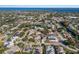 A vibrant neighborhood of well-spaced homes, showcasing a serene community ambiance and a lush green landscape at 8314 9Th Avenue Nw Ter, Bradenton, FL 34209