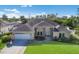 Charming single-Gathering home featuring a well-manicured lawn and inviting facade at 8314 9Th Avenue Nw Ter, Bradenton, FL 34209
