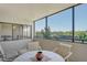 Inviting balcony with seating, offering a relaxing space with scenic waterfront views at 835 S Osprey Ave # 310, Sarasota, FL 34236