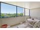 Inviting balcony with outdoor seating, offering a relaxing space with scenic views at 835 S Osprey Ave # 310, Sarasota, FL 34236