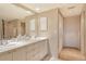 Clean bathroom with double sink vanity, ample storage, and neutral tones at 835 S Osprey Ave # 310, Sarasota, FL 34236