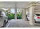 A well-lit parking garage featuring assigned parking spaces and lush landscaping provides secure and convenient parking at 835 S Osprey Ave # 310, Sarasota, FL 34236