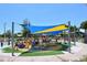 Colorful playground featuring slides, climbing structures, and shaded areas for children to enjoy outdoor play at 835 S Osprey Ave # 310, Sarasota, FL 34236