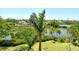 Beautiful water view featuring lush greenery and a charming bridge from a high vantage point at 835 S Osprey Ave # 310, Sarasota, FL 34236