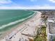 Aerial view of beachfront property with a sandy beach and ocean at 915 Seaside Dr Weeks 22-23 # 405, Sarasota, FL 34242