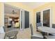 Balcony with outdoor seating and access to living room and kitchen at 915 Seaside Dr # 405 Weeks 22-23, Sarasota, FL 34242