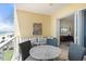 Balcony with outdoor seating and scenic beach views at 915 Seaside Dr # 405 Weeks 22-23, Sarasota, FL 34242