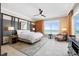 Bedroom featuring a large window with a view of the ocean and a ceiling fan at 915 Seaside Dr # 405 Weeks 22-23, Sarasota, FL 34242