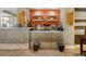 Convenient coffee bar with modern appliances, ample counter space, and neutral decor at 915 Seaside Dr # 405 Weeks 22-23, Sarasota, FL 34242