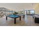 Bright game room with billiard and ping pong tables, plus views to the ocean at 915 Seaside Dr # 405 Weeks 22-23, Sarasota, FL 34242
