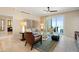 Light filled living room with tile flooring, contemporary furnishings and ocean view at 915 Seaside Dr Weeks 22-23 # 405, Sarasota, FL 34242