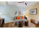 Comfortable living room featuring stylish seating, hardwood floors, and attractive decor at 915 Seaside Dr # 405 Weeks 22-23, Sarasota, FL 34242