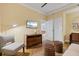 Cozy living area with modern furnishings, hardwood flooring, and a mounted television at 915 Seaside Dr # 405 Weeks 22-23, Sarasota, FL 34242