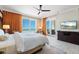 Main bedroom featuring large window with view of beach and access to balcony at 915 Seaside Dr # 405 Weeks 22-23, Sarasota, FL 34242