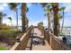 Wooden boardwalk leading to the beach at 915 Seaside Dr # 405 Weeks 22-23, Sarasota, FL 34242