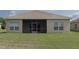 Home featuring a spacious, well-maintained backyard with a screened in patio at 11319 82Nd E St, Parrish, FL 34219