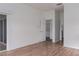 Neutral bedroom with laminate floors and a sliding glass door at 11319 82Nd E St, Parrish, FL 34219