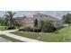 Well-maintained single Gathering home with manicured lawn and mature landscaping at 11319 82Nd E St, Parrish, FL 34219