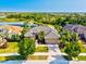 Aerial view of the property showcasing the home, landscaping, and scenic surroundings at 13644 Brilliante Dr, Venice, FL 34293