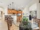 Open-concept dining area with views of the kitchen and formal dining room at 13644 Brilliante Dr, Venice, FL 34293