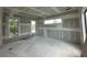 Unfinished living room with drywall showing the location of windows and in-wall wiring during construction progress at 1423 S Shade Ave, Sarasota, FL 34239