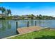 Scenic waterfront view with a private dock and luxury homes at 1542 Gulfview Dr, Sarasota, FL 34236