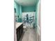 Bathroom with vanity, mirror, and blue octopus themed shower curtain at 16919 Trite Bend St, Wimauma, FL 33598