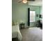 Bright bedroom featuring a small desk and neutral tones at 16919 Trite Bend St, Wimauma, FL 33598