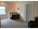 Bright upstairs hallway featuring neutral tones and plenty of natural light from the large window at 16919 Trite Bend St, Wimauma, FL 33598