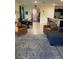 Open living and dining area with stylish furnishings and decor at 16919 Trite Bend St, Wimauma, FL 33598