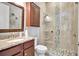 Granite counter tops adorn this bathroom featuring a glass shower with designer accents at 17003 2Nd E Ave, Bradenton, FL 34212