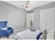 Bedroom featuring closet space, neutral walls, carpet, a ceiling fan, and window at 17003 2Nd E Ave, Bradenton, FL 34212