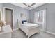 Comfortable bedroom with a cozy bed, plantation shutters, and soft lighting at 17003 2Nd E Ave, Bradenton, FL 34212