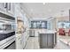 Beautiful kitchen with granite countertops, stainless steel appliances, open layout, and stylish cabinetry at 17003 2Nd E Ave, Bradenton, FL 34212